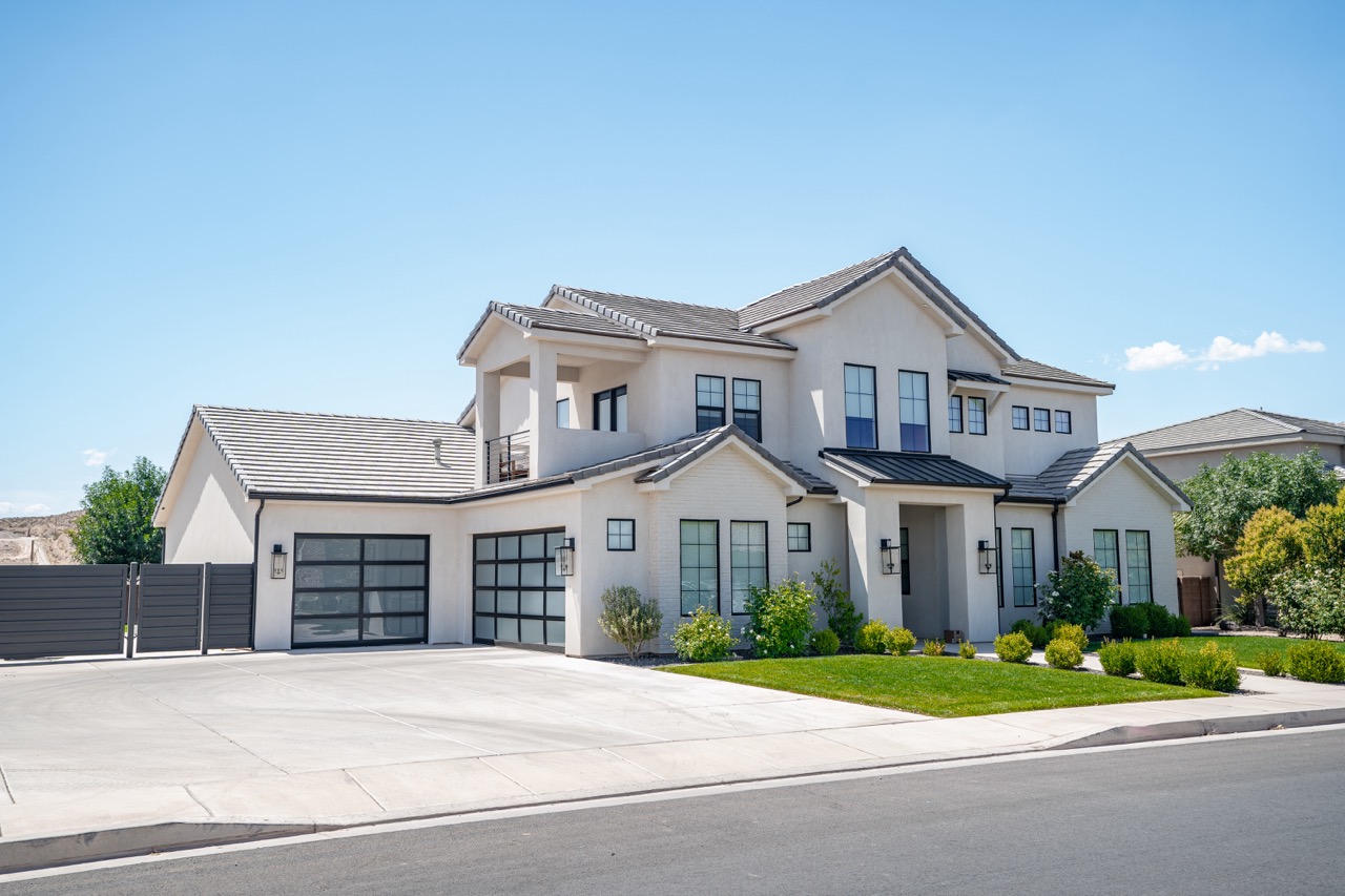 Modern House with Two Glass Garage Doors - Single | Garage Door Repair & Installation in Springville UT | A Plus Garage Doors | Best Garage Door Repair