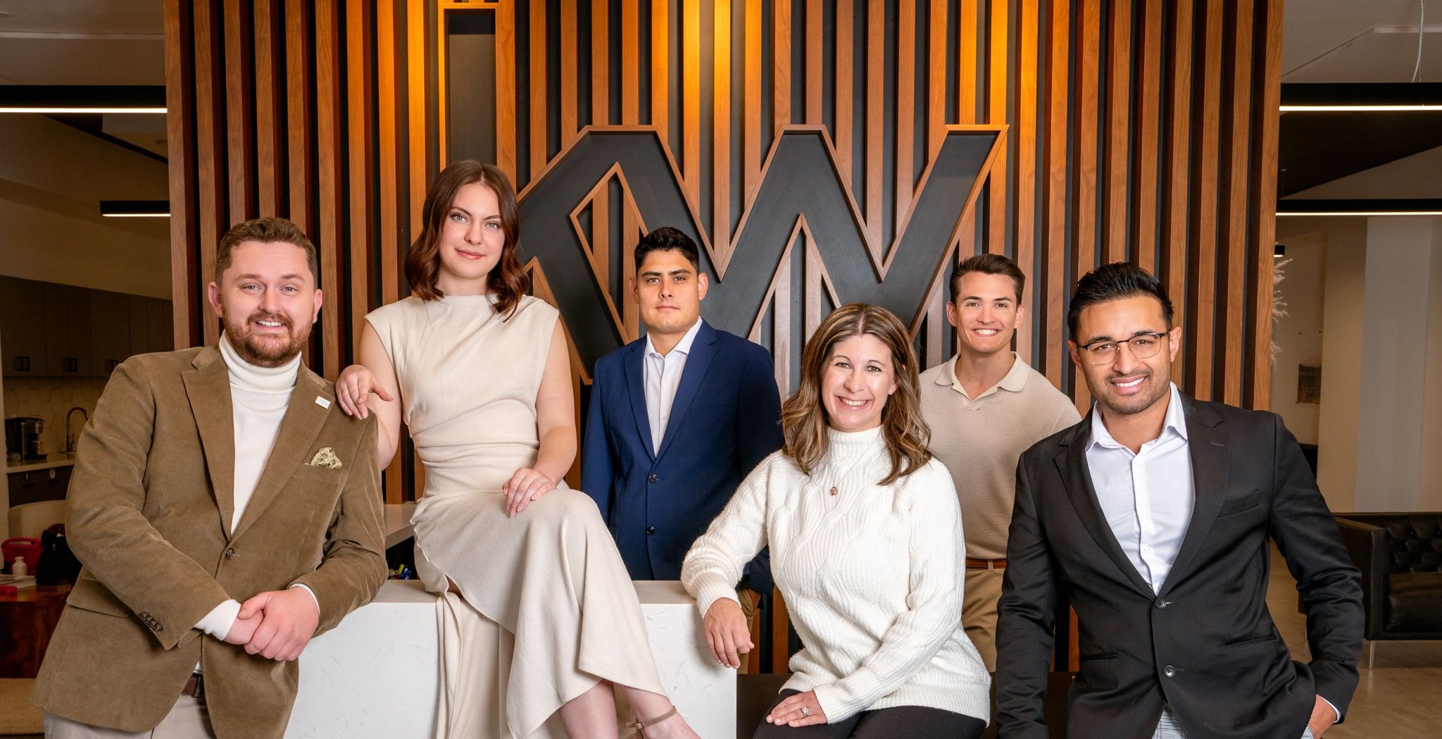 Team Photo of Bryant Real Estate in their fancy North Phoenix Location