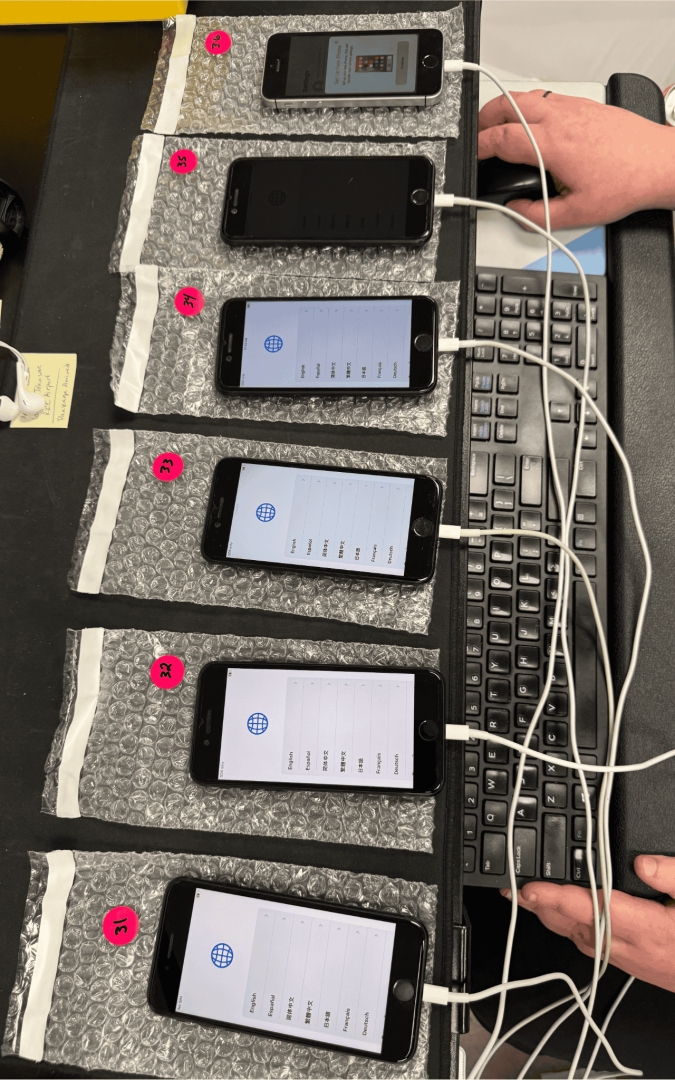 Technicians at SmartphonesPLUS test incoming devices before issuing payout and preparing them for refurbishment and resale.