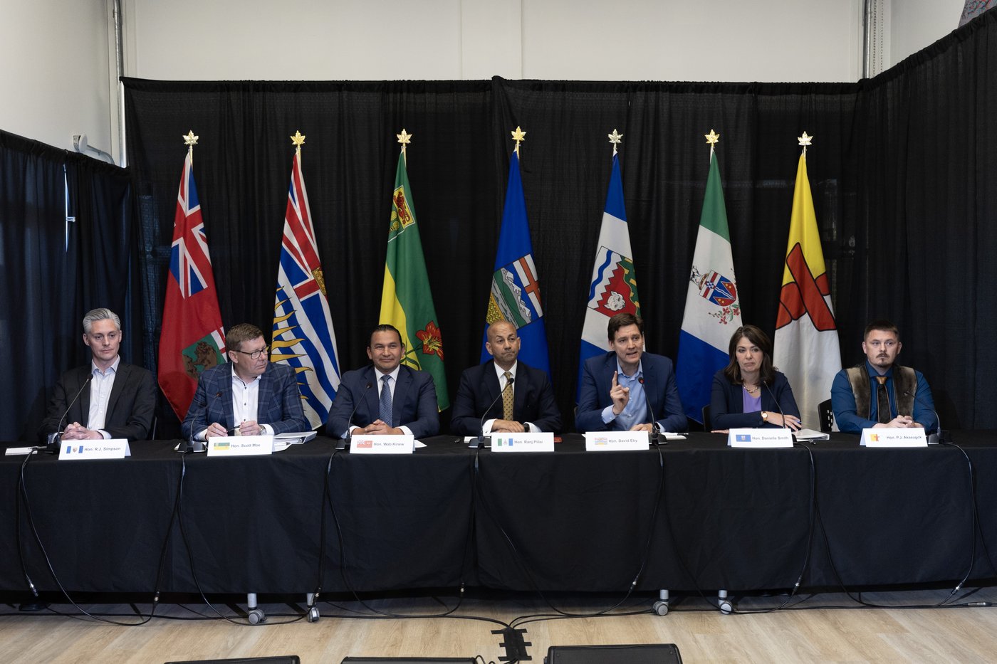 Northwest Territories Premier R.J Simpson, from left, Saskatchewan Premier Scott Moe, Manitoba Premier Wab Kinew, Yukon Premier Ranj Pillai, British Columbia Premier David Eby, Alberta Premier Danielle Smith and Nunavut Premier P.J. Akeeagok during a media availability at the 2024 western premiers conference in Whitehorse, Monday, June 10, 2024. CANADIAN PRESS/Crystal Schick