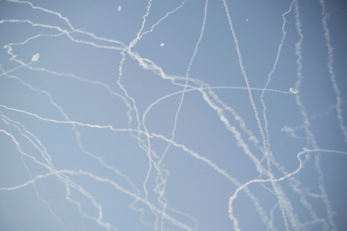 FILE - Israeli air defense system fires to intercept missiles during an Iranian attack over Tel Aviv, Israel, Thursday, June 19, 2025. (AP Photo/Leo Correa, File)