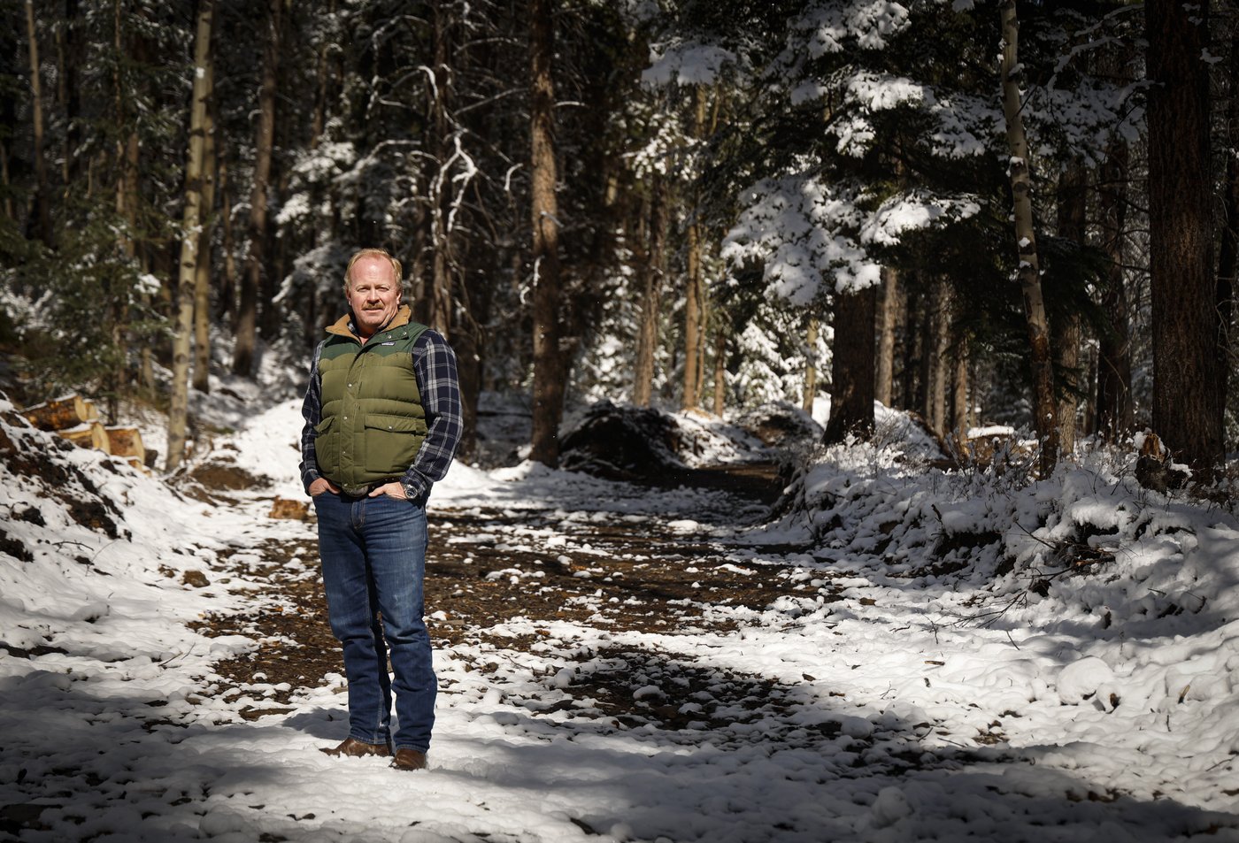 John Third, an investor in a proposed glamping site, stands in a portion of the site in Canmore, Alta., Thursday, April 23, 2026.THE CANADIAN PRESS/Jeff McIntosh