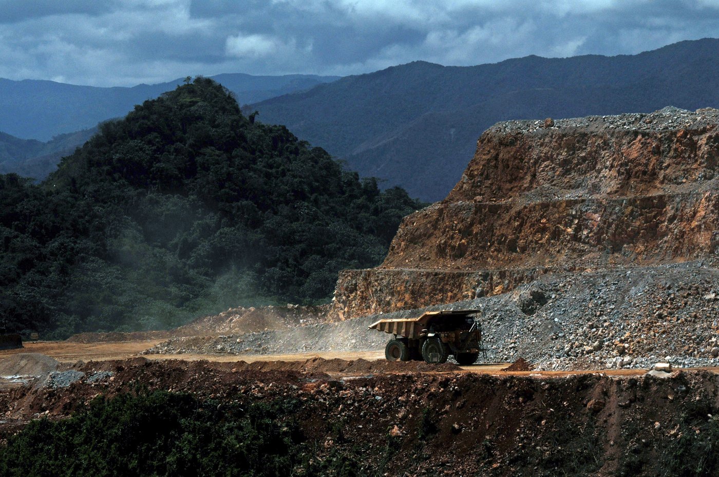 In this photo taken March 20, 2012, a truck drives along a hill of Pueblo Viejo mine in the Sanchez Ramirez province, about 60 miles (100 kms) northwest of Santo Domingo, Dominican Republic. (AP Photo/Manuel Diaz) DOMINICAN REPUBLIC OUT - NO USAS EN REPUBLICA DOMINICANA