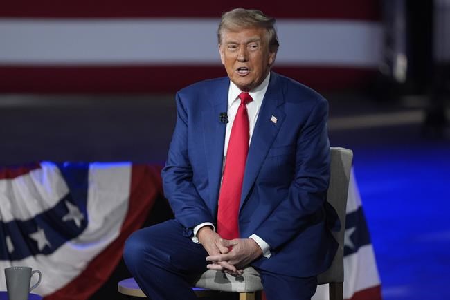Republican presidential nominee former President Donald Trump participates in a town hall with FOX News host Sean Hannity at the New Holland Arena, Wednesday, Sept. 4, 2024, in Harrisburg, Pa. (AP Photo/Evan Vucci)