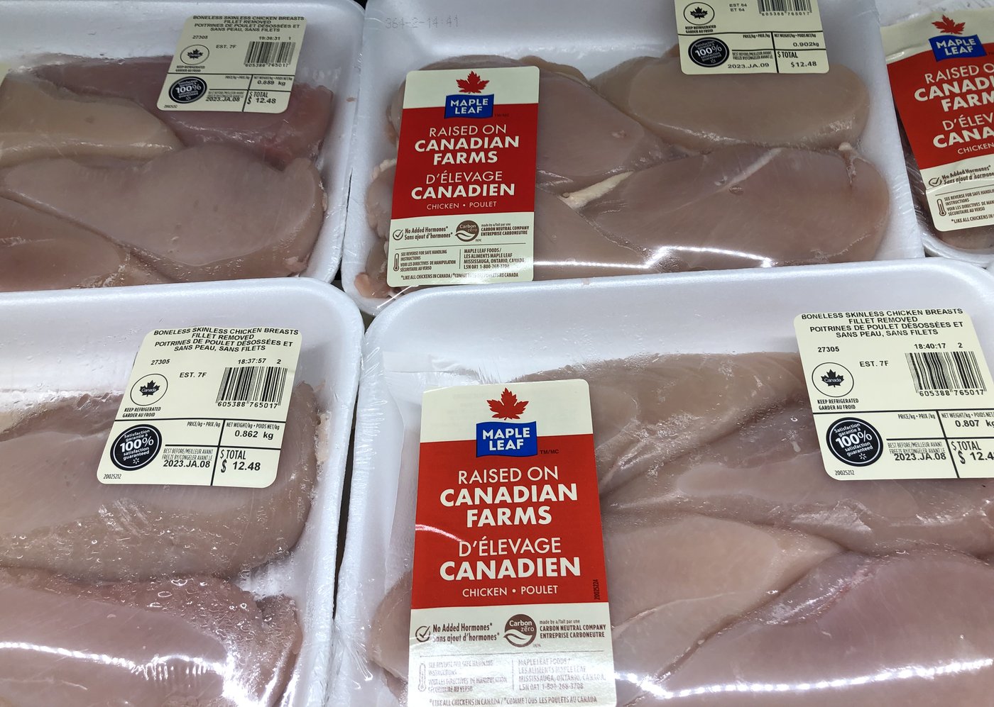 Packages of Maple Leaf Foods chicken breasts are shown on a shelf at a grocery store in Oakville, Ont., Friday, Jan.6, 2023. THE CANADIAN PRESS/Richard Buchan