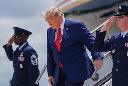 President Donald Trump arrives on Air Force One at Dobbins Air Reserve Base, Wednesday, July 22, 2026, in Marietta, Ga. (AP Photo/Julia Demaree Nikhinson)