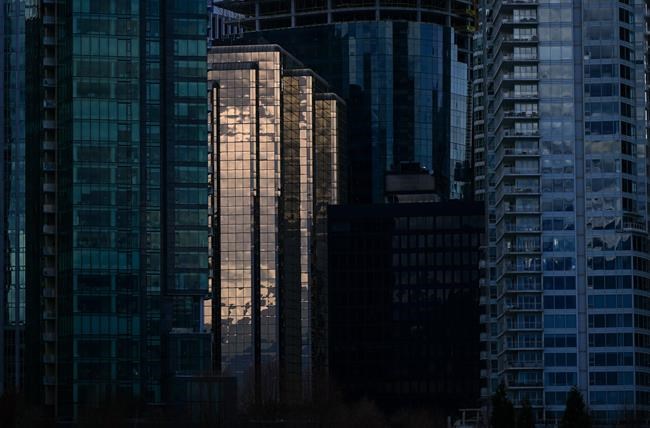 Condo and office towers are seen in downtown Vancouver, on Tuesday, April 25, 2023. A new report by Colliers Canada predicts the national office vacancy rate could peak at approximately 15 per cent by the end of 2024 as the rise of hybrid work models prompt companies to reduce their office space.THE CANADIAN PRESS/Darryl Dyck