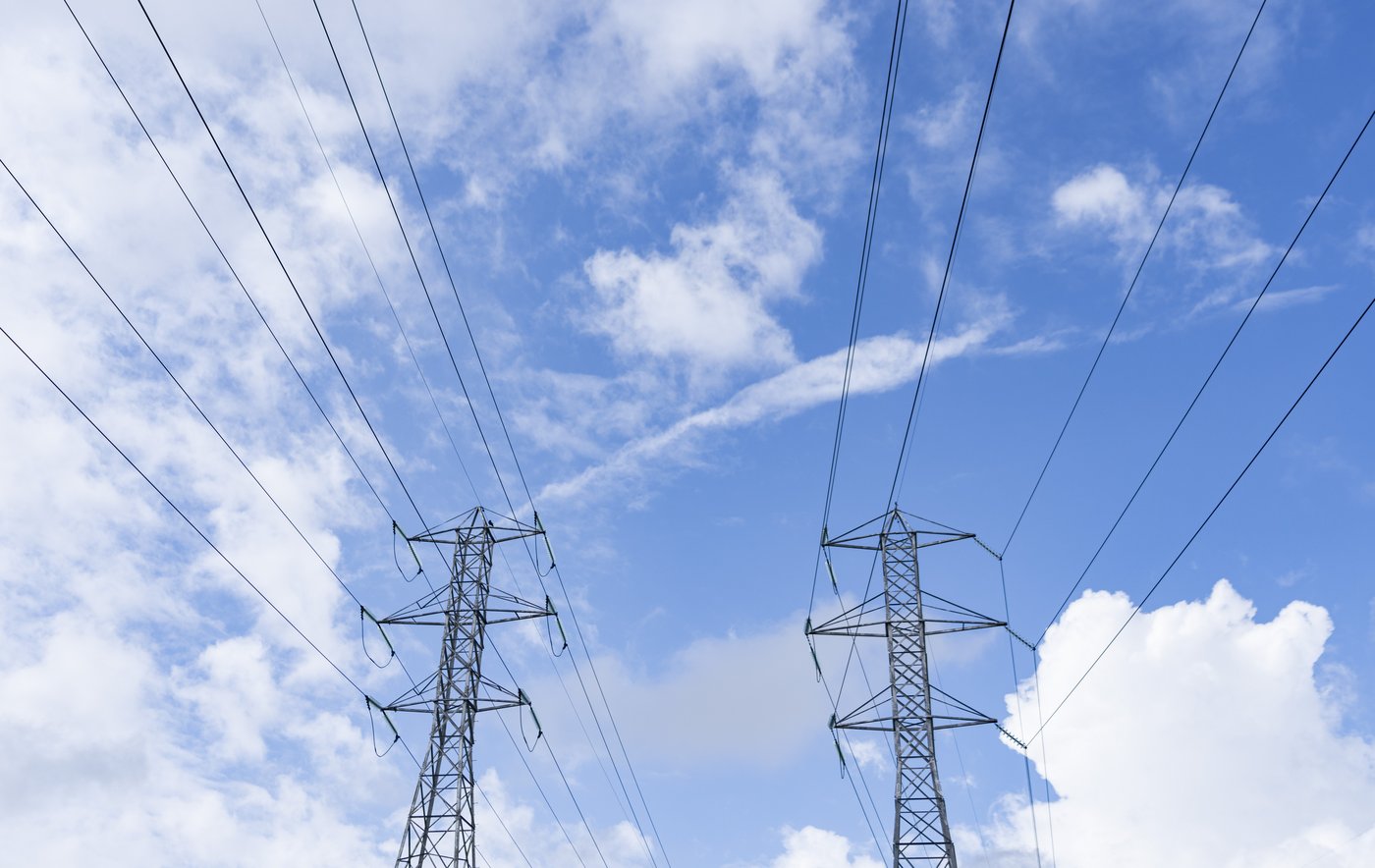 Hydro towers are seen in Montreal, Wednesday, Aug. 30, 2023. THE CANADIAN PRESS/Christinne Muschi