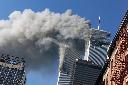 Smoke rises from the burning twin towers of the World Trade Center after hijacked planes crashed into the towers, Sept. 11, 2001, in New York. THE CANADIAN PRESS/AP-Richard Drew