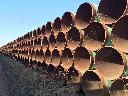 Pipes meant for the defunct Keystone XL project are shown stacked at a yard in Gascoyne, N.D., on Wednesday April 22, 2015. THE CANADIAN PRESS/Alex Panetta