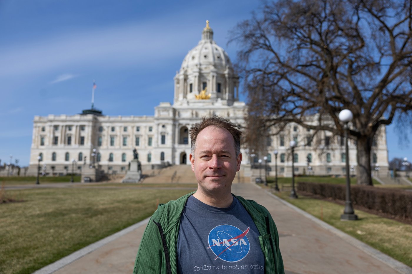 Colin Lee, founder of the Civic Loon app, poses for a portrait outside the Minnesota State Capitol, Tuesday, April 7, 2026, in St. Paul, Minn. (Ellen Schmidt/MinnPost/CatchLight Local/Report for America via AP)