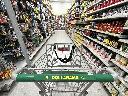 A shopping cart is seen in an aisle of a Dollarama store in Montreal, Wednesday, June 7, 2023. THE CANADIAN PRESS/Christinne Muschi