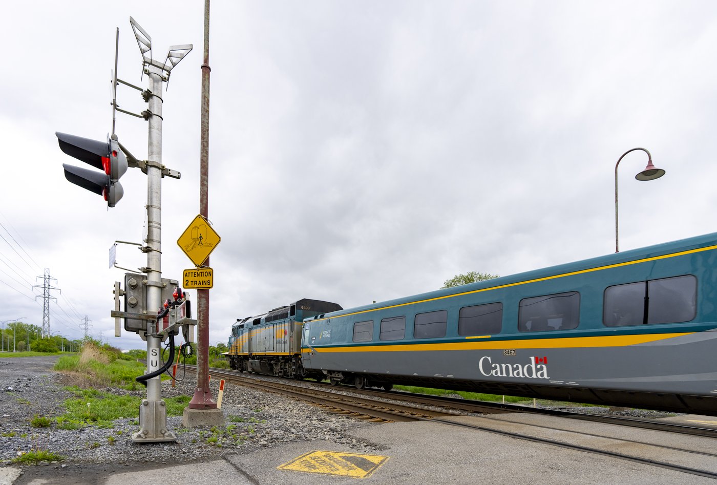A Via Rail train is seen on tracks in the Montreal suburb of Beaconsfield as it heads out of the city on Friday, May 23, 2025. THE CANADIAN PRESS/Christinne Muschi