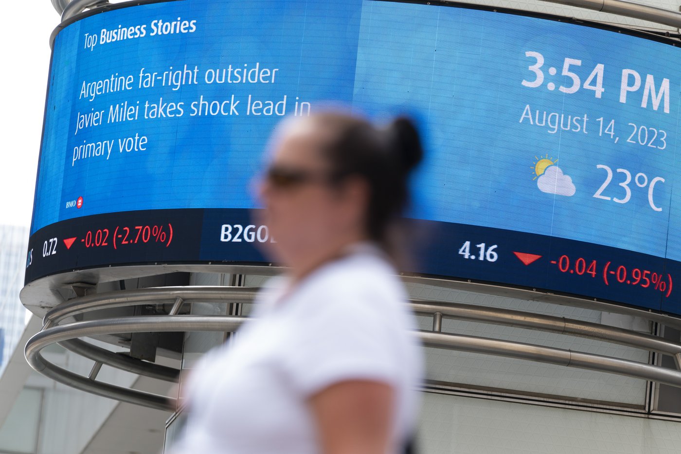 A Bank of Montreal (BMO) electronic ticker showing the stock prices of certain commodities is seen in the Financial District of Toronto, Aug. 14, 2023. THE CANADIAN PRESS/Spencer Colby