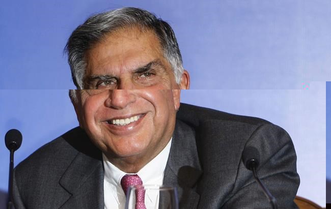 FILE - Tata Sons Chairman Ratan Tata reacts as he speaks during a press conference prior to the launch event of the Tata Nano in Mumbai, India, March 23, 2009. (AP Photo/Gautam Singh, File)