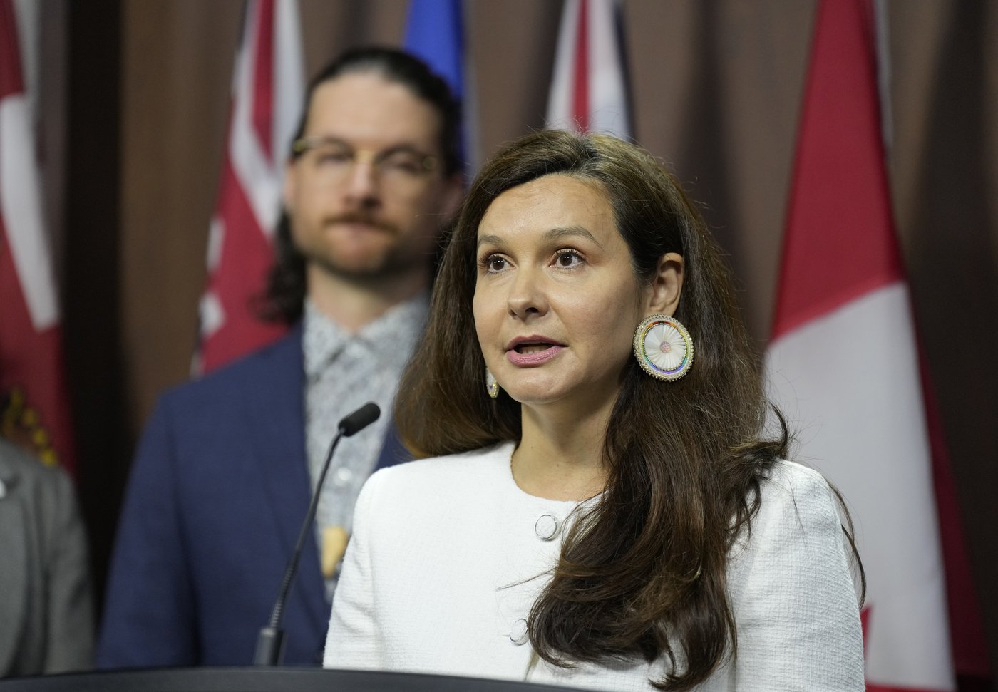 Sacred Earth Executive Director Melina Leboucan-Massimo speaks about an east west electricity grid during a news conference on Parliament Hill in Ottawa, Monday Sept. 22, 2025.THE CANADIAN PRESS/Adrian Wyld