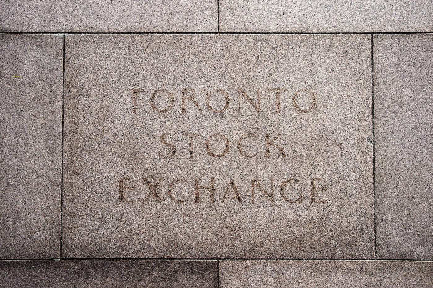 The fading name on the building in Toronto that used to house the Toronto Stock Exchange is pictured on August 18, 2011. THE CANADIAN PRESS/Aaron Vincent Elkaim