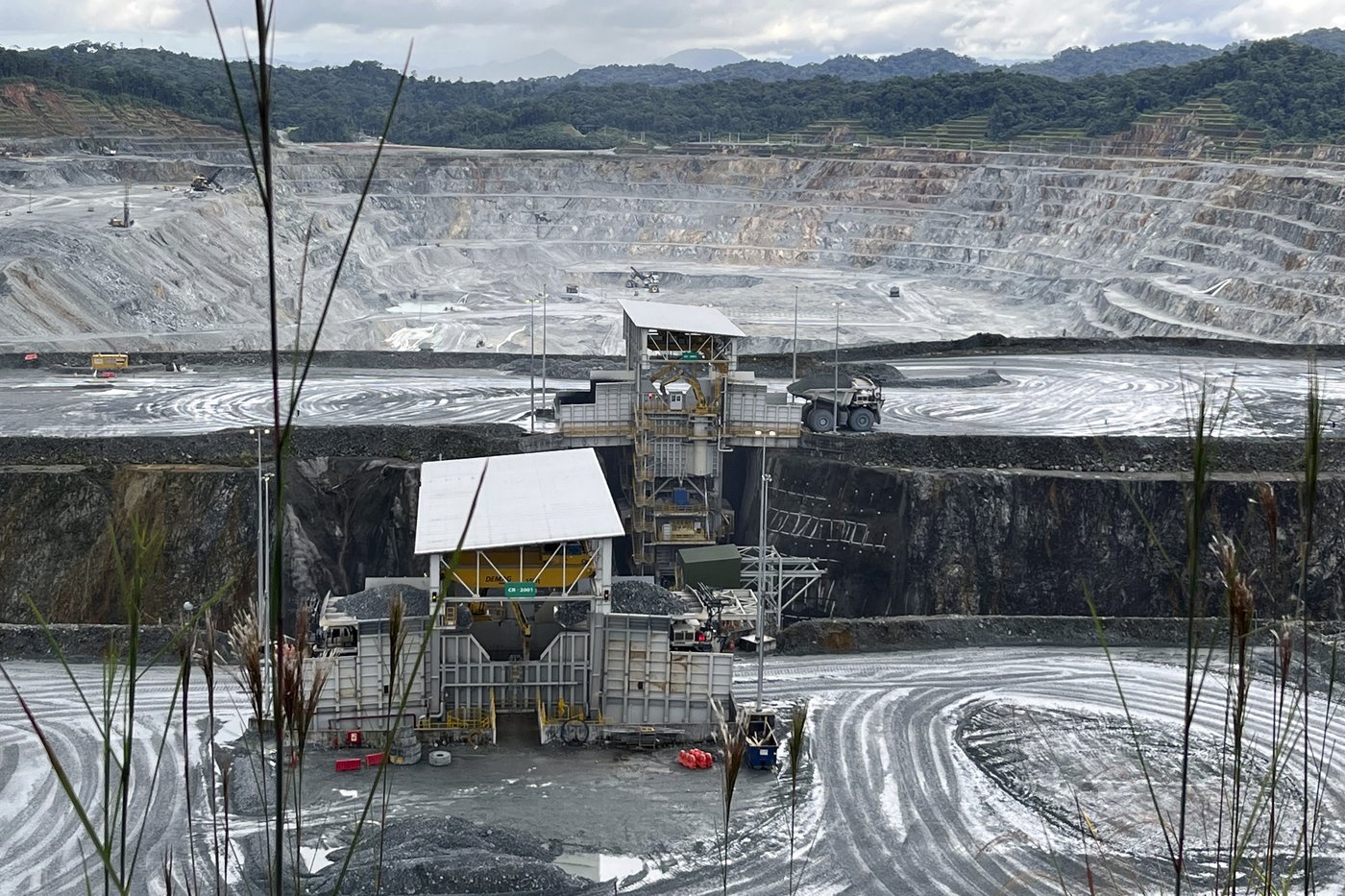 The open pit copper mine Cobre Panamá, run by Panamanian Mining company Minera Panamá, a subsidiary of Canada's First Quantum Minerals Ltd., stands in Donoso, Panama, Dec. 6, 2022. (AP Photo/Abraham Teran)