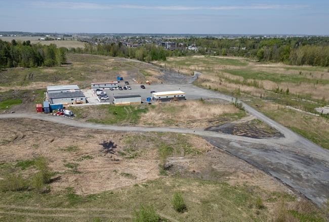 An aerial view of the land being developed by Northvolt, the new EV battery plant being built by the Swedish manufacturer in Saint-Basile-le-Grand, east of Montreal, Que.,Thursday, May 16, 2024. THE CANADIAN PRESS/Christinne Muschi