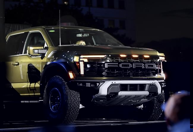 The new F-150 Raptor is revealed at F-150 Fest in Detroit on Tuesday, Sept. 12, 2023. (Robin Buckson/Detroit News via AP)