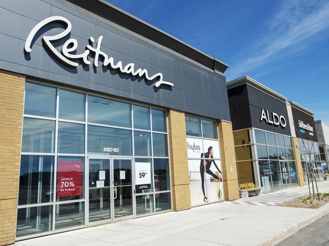A Reitman's clothing store is seen next to an Aldo shoe store at an outdoor mall in Montreal, Tuesday, May 19, 2020. THE CANADIAN PRESS/Ryan Remiorz