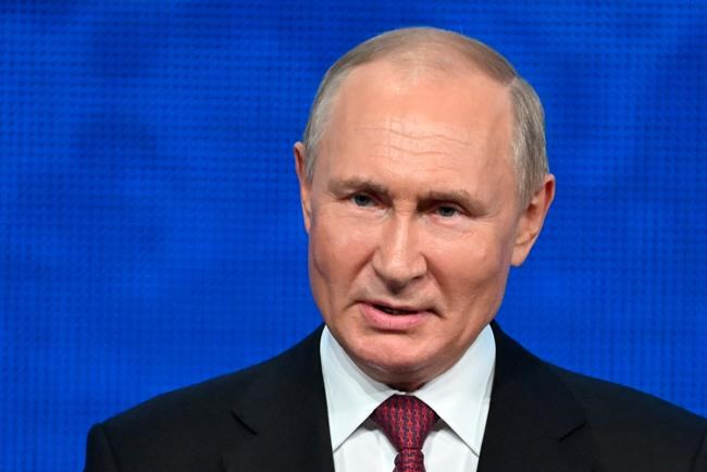 Russian President Vladimir Putin addresses an event marking the 100th anniversary of the republic of Adygea, Kabardino-Balkaria and Karachayevo-Circasia, at the State Kremlin Palace in Moscow, Russia, Tuesday, Sept. 20, 2022. (Grigory Sysoev, Sputnik, Kremlin Pool Photo via AP)