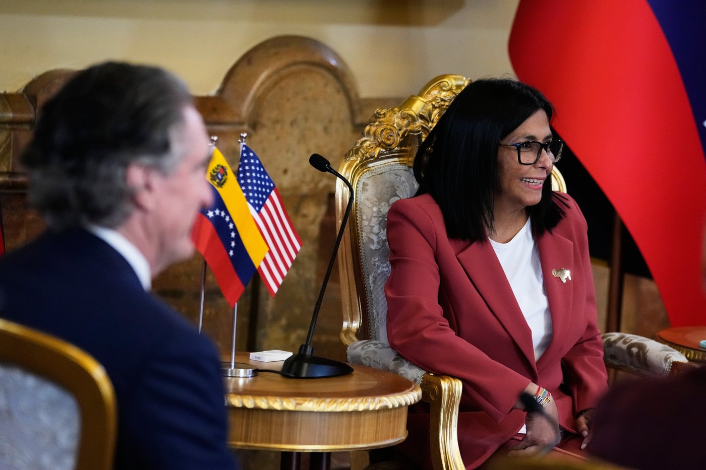 Venezuela's acting President Delcy Rodriguez, right, and U.S. Interior Secretary Doug Burgum meet at Miraflores presidential palace in Caracas, Venezuela, Wednesday, March 4, 2026. (AP Photo/Ariana Cubillos)