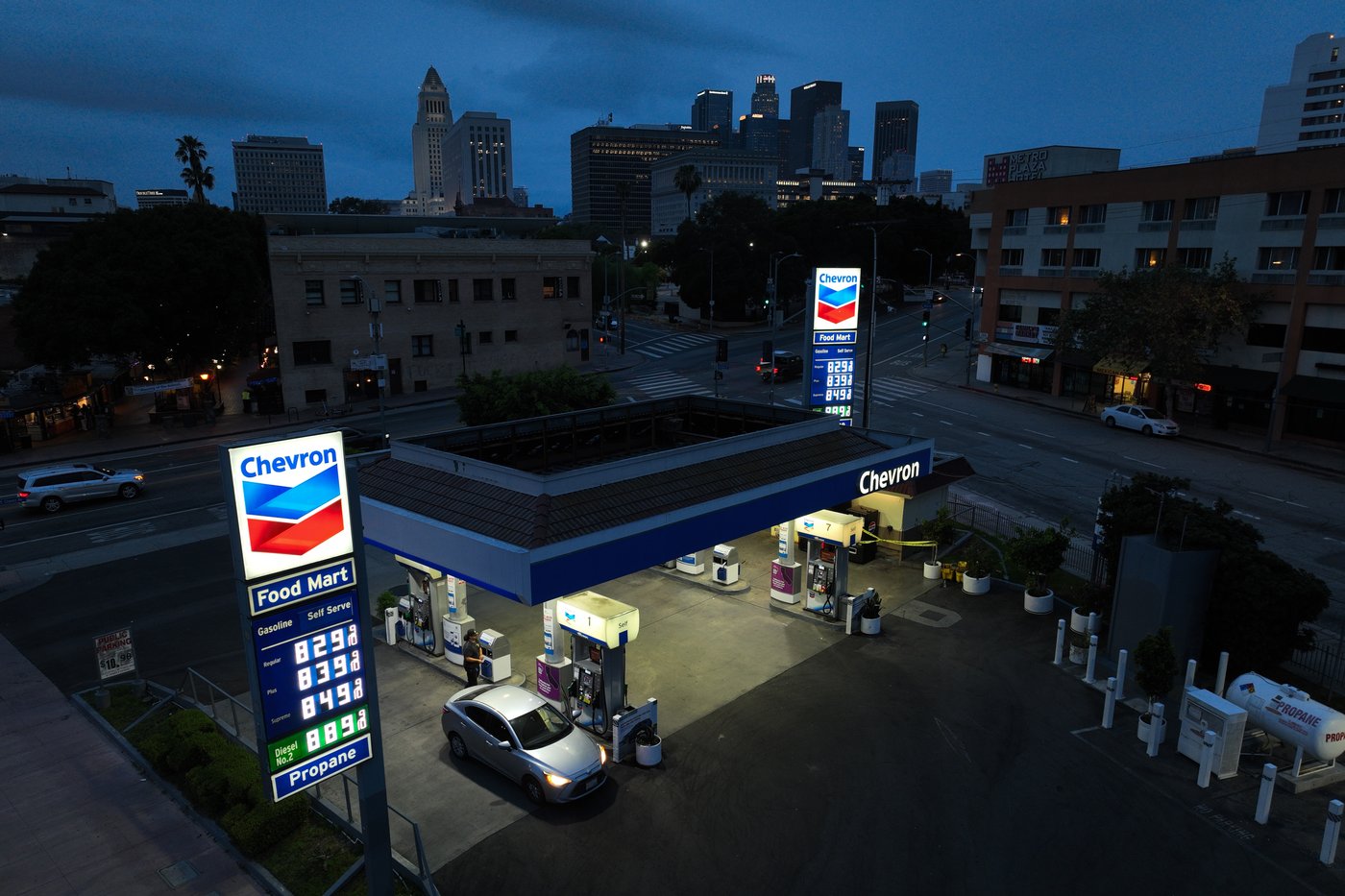 Gas prices are displayed at a Chevron gas station, in downtown Los Angeles, Tuesday, March 31, 2026. (AP Photo/Jae C. Hong)