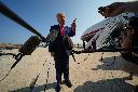 President Donald Trump speaks to reporters before boarding Air Force One, Wednesday, July 22, 2026, at Joint Base Andrews, Md. (AP Photo/Julia Demaree Nikhinson)