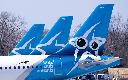 Air Transat aircraft are seen on the tarmac at Montreal-Trudeau International Airport in Montreal, on Wednesday, April 8, 2020. THE CANADIAN PRESS/Paul Chiasson