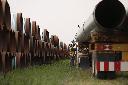 Derek Johnson, Supervisor/operator for Enbridge loads pipe at a storage facility just west of Morden, Man., Thursday, Aug. 16, 2018. THE CANADIAN PRESS/John Woods