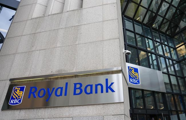 Royal Bank of Canada signage is pictured in the financial district in Toronto, Friday, Sept. 8, 2023.&nbsp;Royal Bank of Canada says it plans to ramp up its renewable energy funding as it reported little progress on reducing the emissions intensity of its oil and gas financing. THE CANADIAN PRESS/Andrew Lahodynskyj