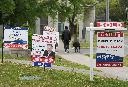 A person walks past multiple for-sale and sold real estate signs in Mississauga, Ont., on Wednesday, May 24, 2023. THE CANADIAN PRESS/Nathan Denette