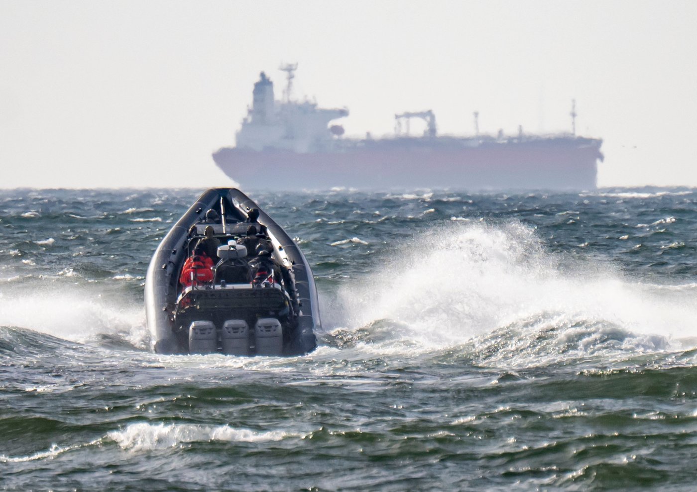 The Swedish Police National Task Force (NI) and the Coast Guard on their way to the already boarded tanker Sea Owl I, outside Trelleborg, Sweden, Friday, March 13, 2026. (Johan Nilsson/TT via AP)