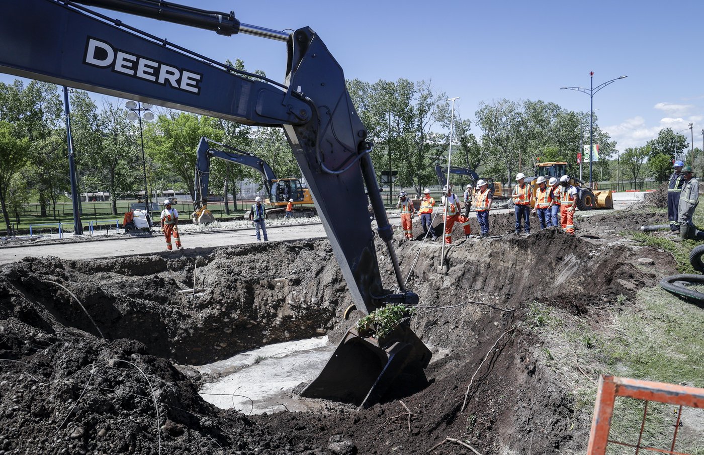 City crews repair a major water main in Calgary on Friday, June 7, 2024. THE CANADIAN PRESS/Jeff McIntosh