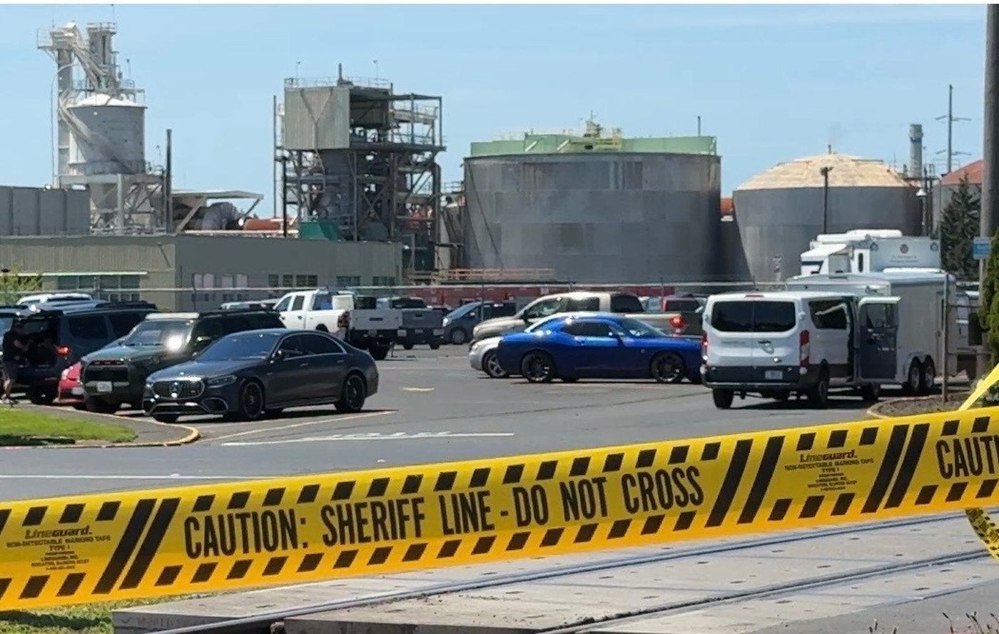 Yellow police tape is seen on May 27, 2026 outside the Longview, Wash. paper mill where a deadly chemical tank failure occurred. (AP Photo/Claire Rush)