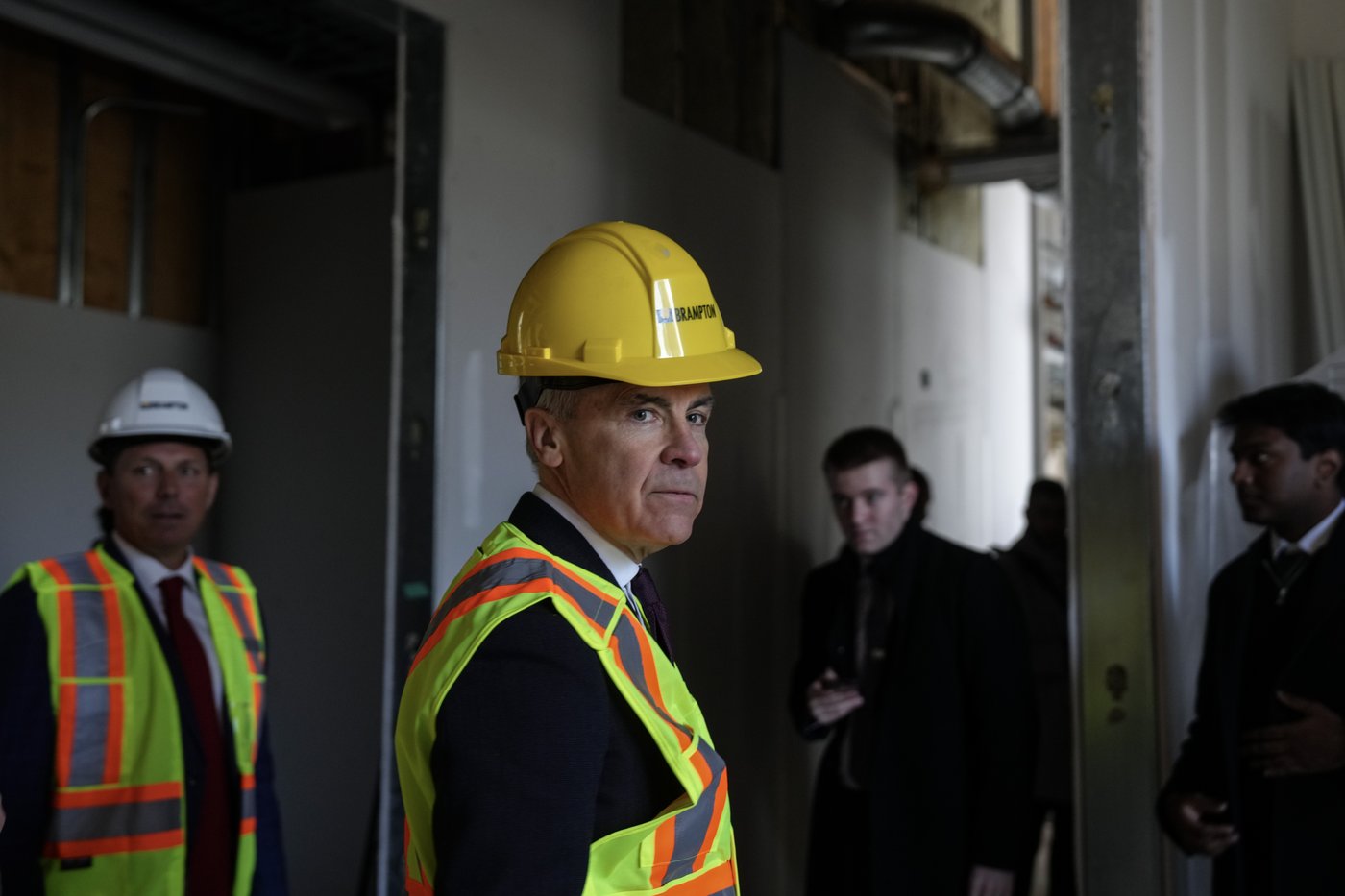 Prime Minister Mark Carney visits a construction site next to the Century Garden Recreation Centre in Brampton, Ont. before making an announcement on Tuesday April 7 2026. THE CANADIAN PRESS/Chris Young