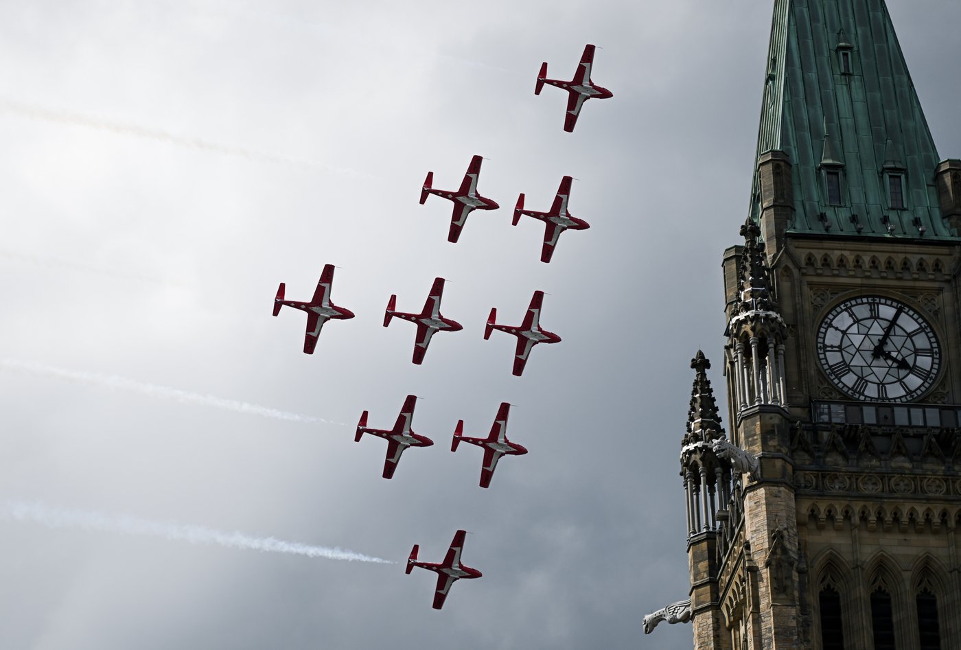 File photo -- Royal Canadian Air Force (RCAF) Snowbirds conduct a fly-past over Parliament Hill during Canada Day celebrations at LeBreton Flats in Ottawa, on Tuesday, July 1, 2025. THE CANADIAN PRESS/Spencer Colby