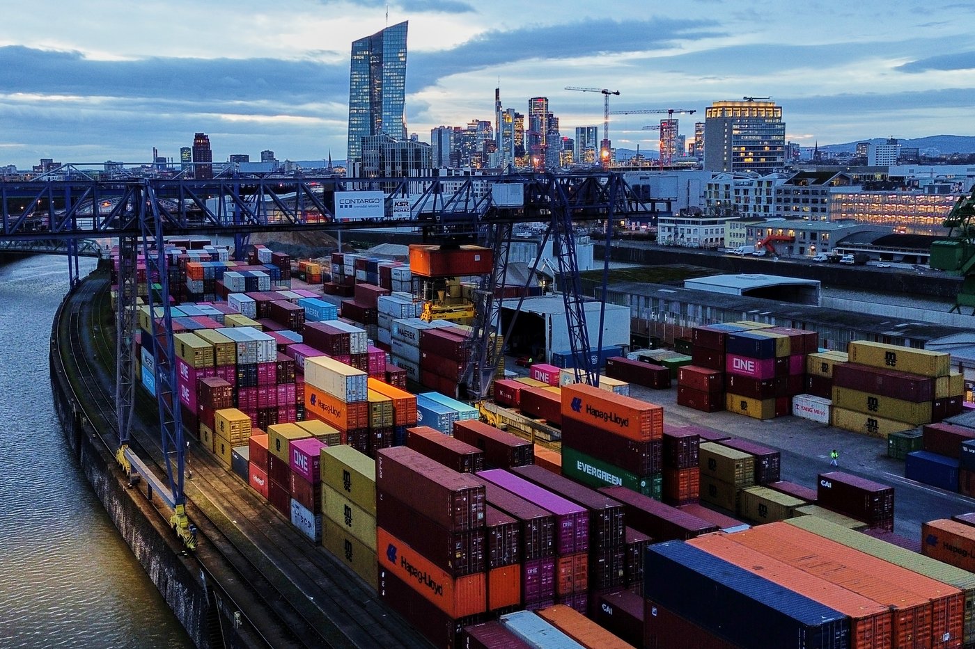 Containers are stored in a cargo terminal in Frankfurt, Germany, Monday, Feb. 23, 2026. (AP Photo/Michael Probst)