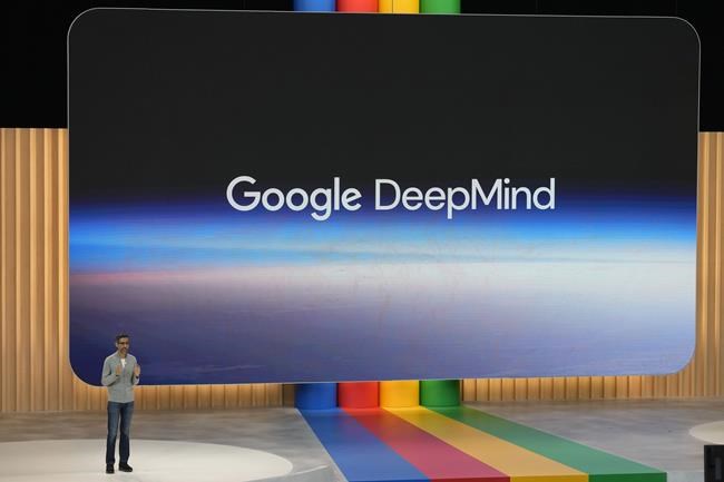 FILE - Alphabet CEO Sundar Pichai speaks about Google DeepMind at a Google I/O event in Mountain View, Calif., Wednesday, May 10, 2023. Google on Thursday, Feb. 7, 2024, introduced a free artificial intelligence app that will implant the technology on smartphones to enable people to quickly connect to a digital brain that can write for them, interpret what they're reading and seeing in addition to helping manage their lives. (AP Photo/Jeff Chiu, File)