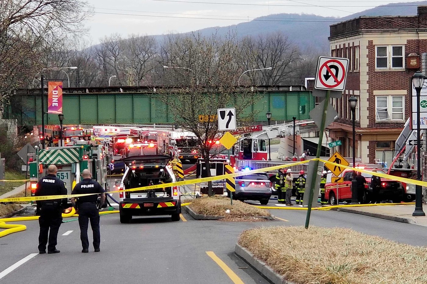 FILE - Emergency personnel work at the site of a deadly explosion at a chocolate factory in West Reading, Pa., on March 25, 2023. (Michelle Lynch/Reading Eagle via AP, File)