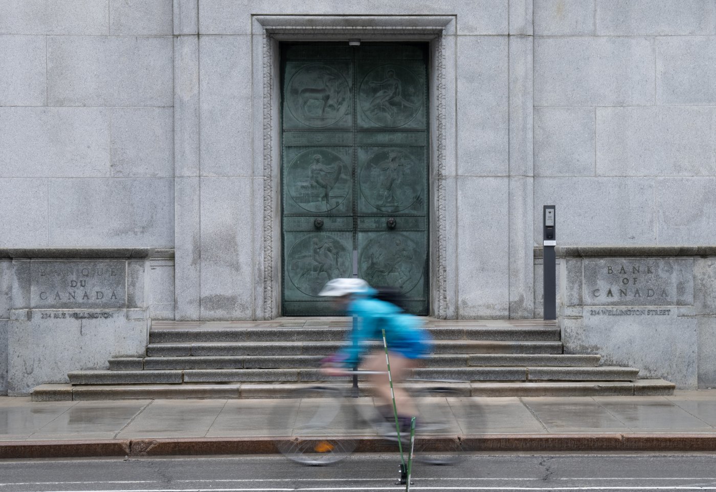 A cyclists passes the Bank of Canada in Ottawa, Wednesday, June 10, 2026. THE CANADIAN PRESS/Adrian Wyld