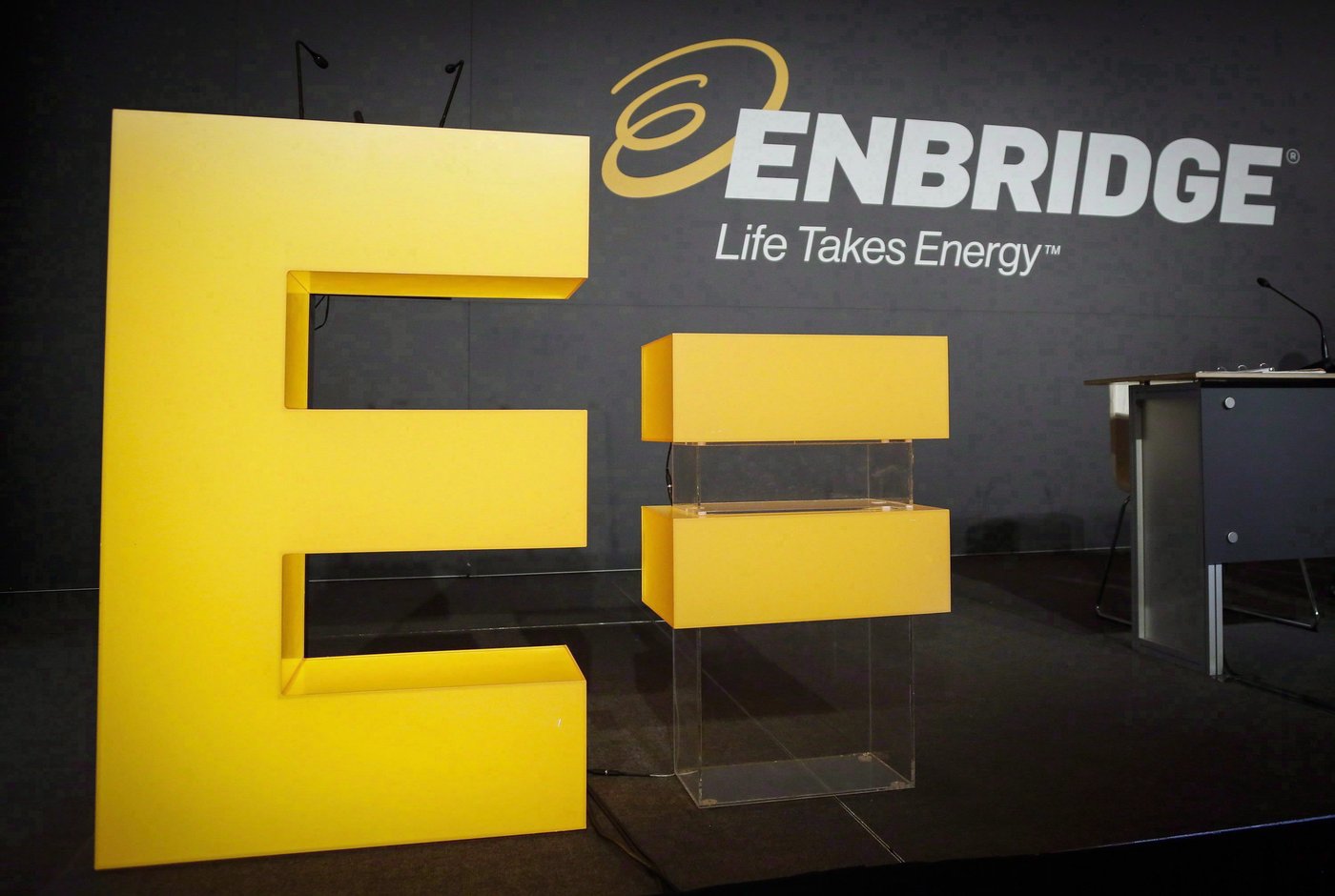 Enbridge company logos are seen at the company's annual meeting in Calgary, Thursday, May 12, 2016. THE CANADIAN PRESS/Jeff McIntosh