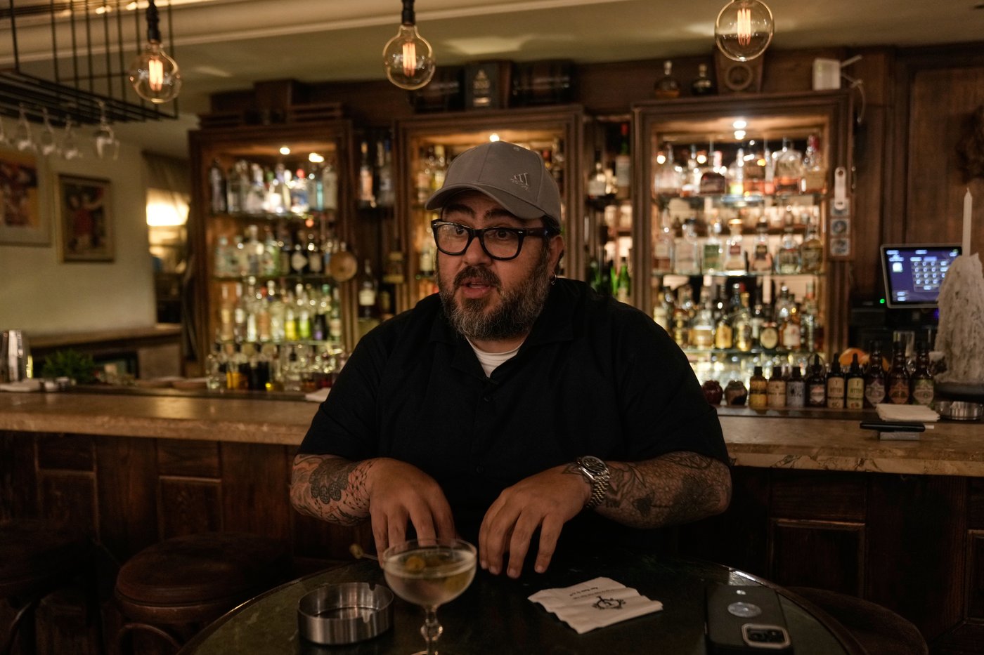 Bar and restaurant owner Riad Aboulteif speaks during an interview with The Associated Press at his bar on Hamra Street in Beirut, May 5, 2026. (AP Photo/Bilal Hussein)