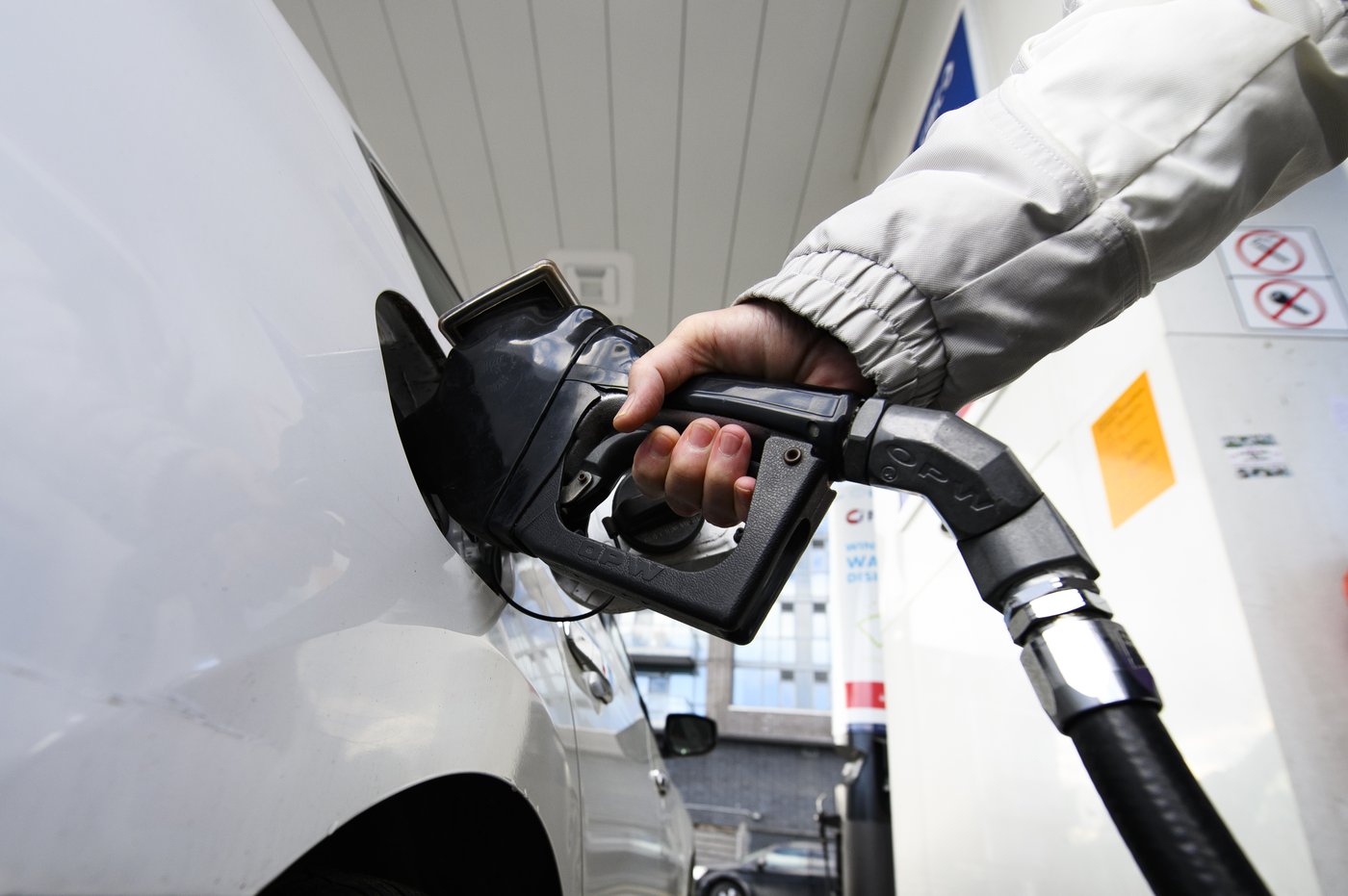 A person pumps gas at a gas station in Mississauga, Ont., Tuesday, Feb. 13, 2024. THE CANADIAN PRESS/Christopher Katsarov
