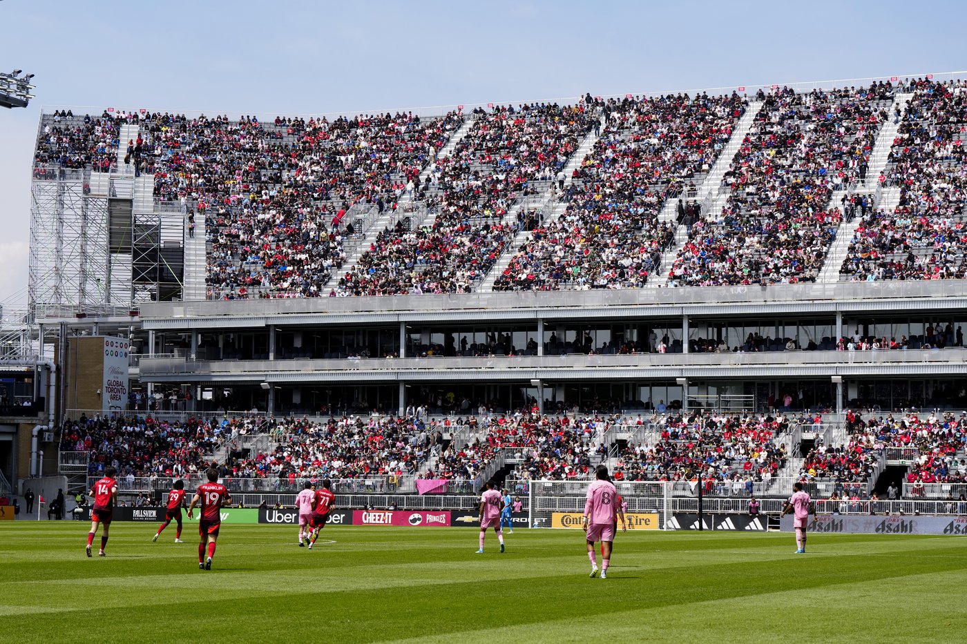 Fans watch from temporary stands at BMO Field, which were built to accommodate more fans for the 2026 World Cup, during first half MLS soccer between Toronto FC and Inter Miami CF, in Toronto on Saturday, May 9, 2026. THE CANADIAN PRESS/Frank Gunn