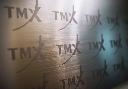 The TMX Group logo, home of the TSX, is shown in Toronto on June 28, 2013. THE CANADIAN PRESS/Aaron Vincent Elkaim