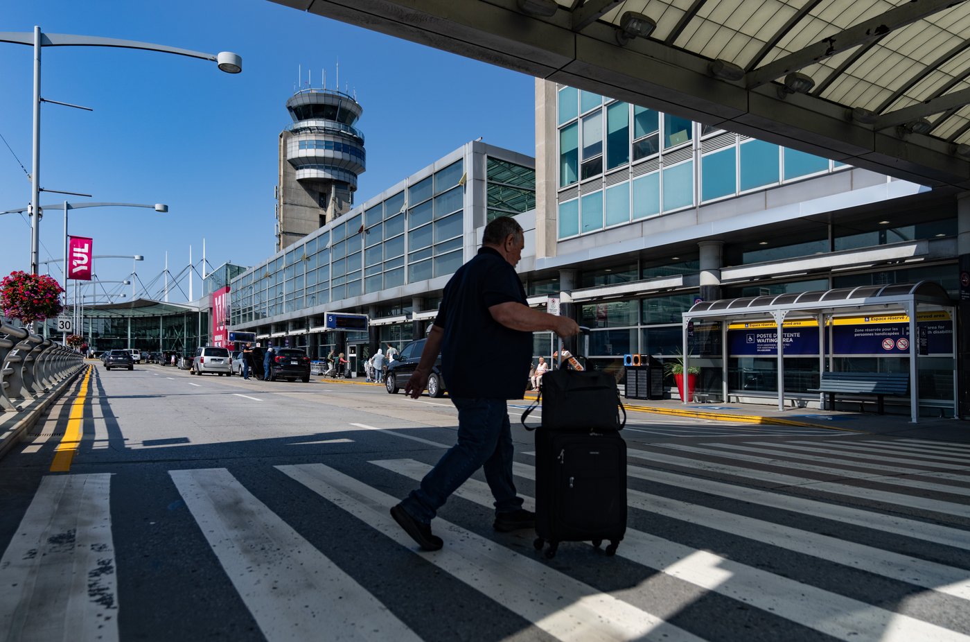 A traveller arrives at the Montreal-Pierre Elliott Trudeau International Airport in Montreal, Friday, Sept.13, 2024. THE CANADIAN PRESS/Christinne Muschi