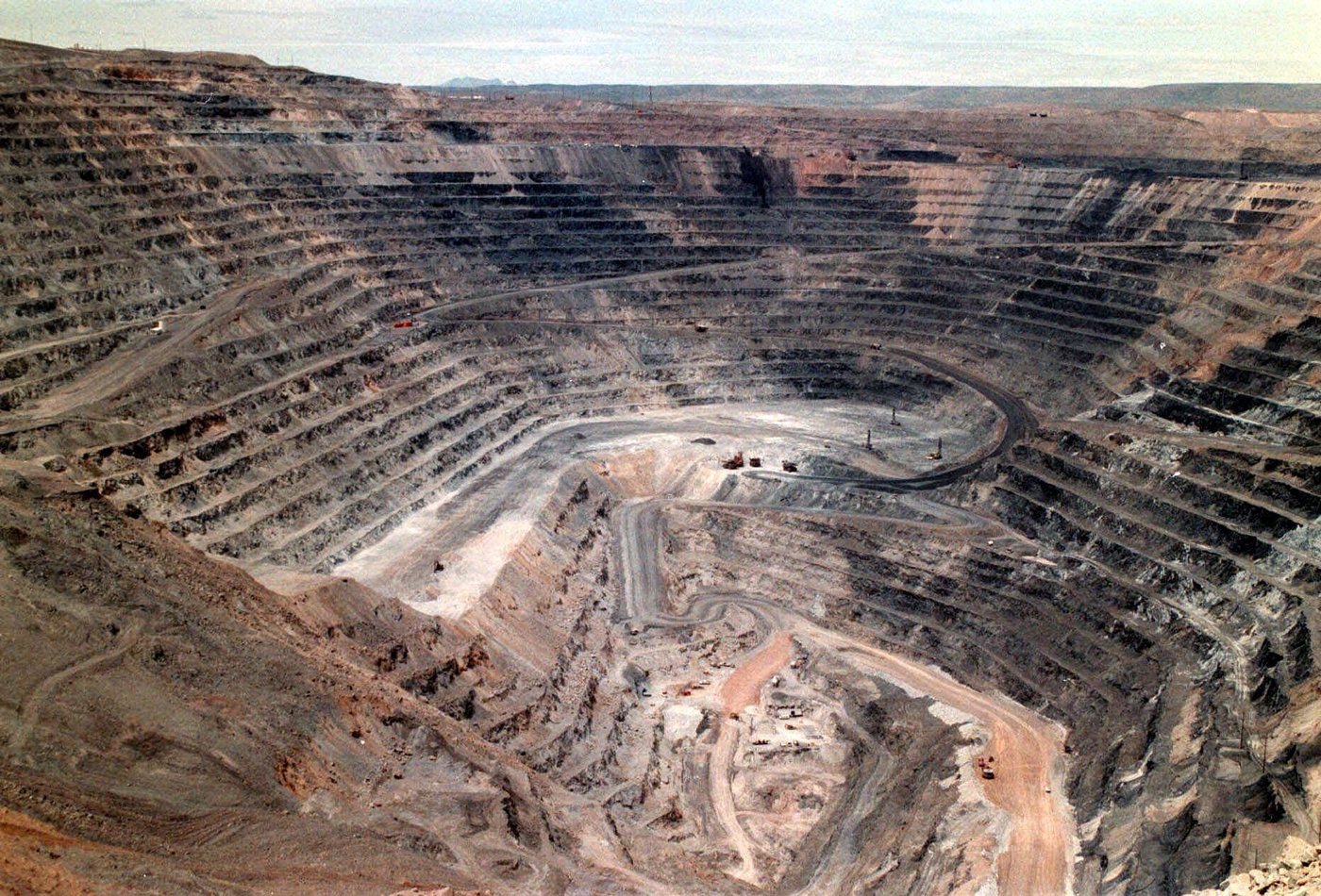 FILE - This undated file photo shows Barrick Goldstrike Mines' Betze-Post open pit near Carlin, Nev. AP Photo/Elko Daily Free Press, Adella Harding, file)