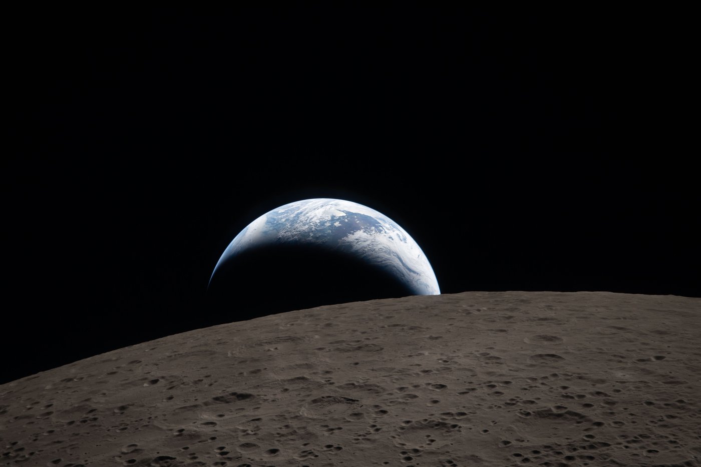 Earthset captured through the Orion spacecraft window at 6:41 p.m. EDT, April 6, 2026, during the Artemis II crewâs flyby of the Moon, is shown in this handout photo. THE CANADIAN PRESS/Handout - NASA (Mandatory Credit)